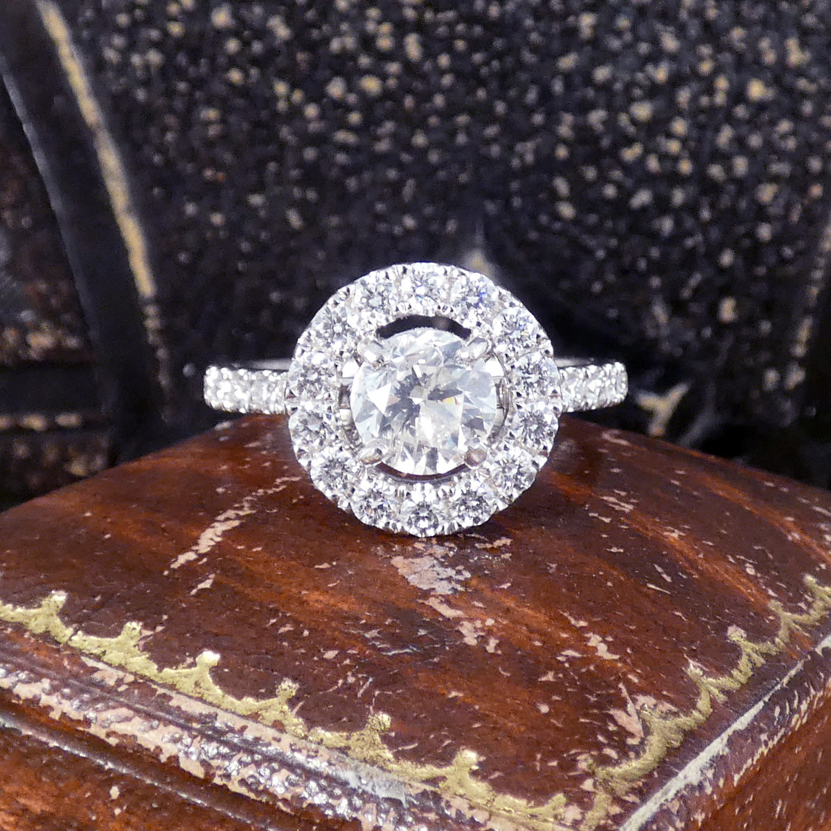 1.74ct Diamond Halo Engagement Ring with Diamond Set Shoulders in Platinum. Featuring a 1.00ct diamond round cut diamond centre with a surround of 0.74ct creating extra sparkle. Wedfit design making it the perfect engagement ring. Displayed in vintage box, the perfect gift.