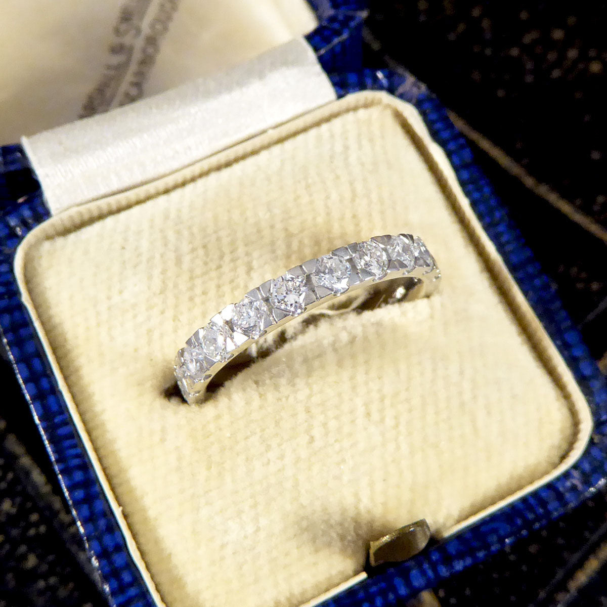 Modern Diamond Half Eternity Ring in Platinum