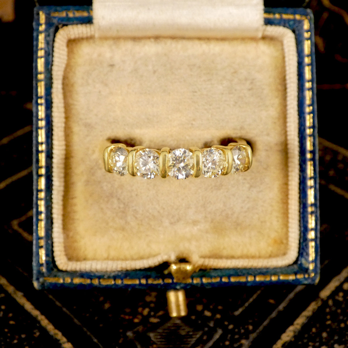 A gorgeous clear and bright brilliant cut five stone diamond ring fully crafted in 18ct Yellow Gold, perfectly stackable.