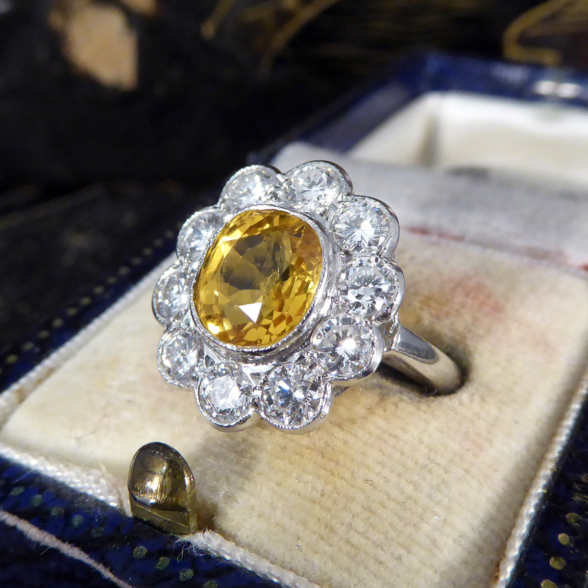 Bright and Rich 2.90ct Cushioned Oval Yellow Sapphire and 1.30ct Diamond Cluster Ring in Platinum