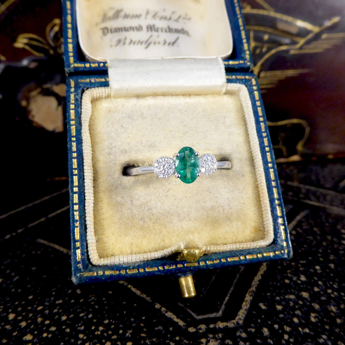 Emerald and Diamond Illusion Three Stone Ring in 18ct White Gold