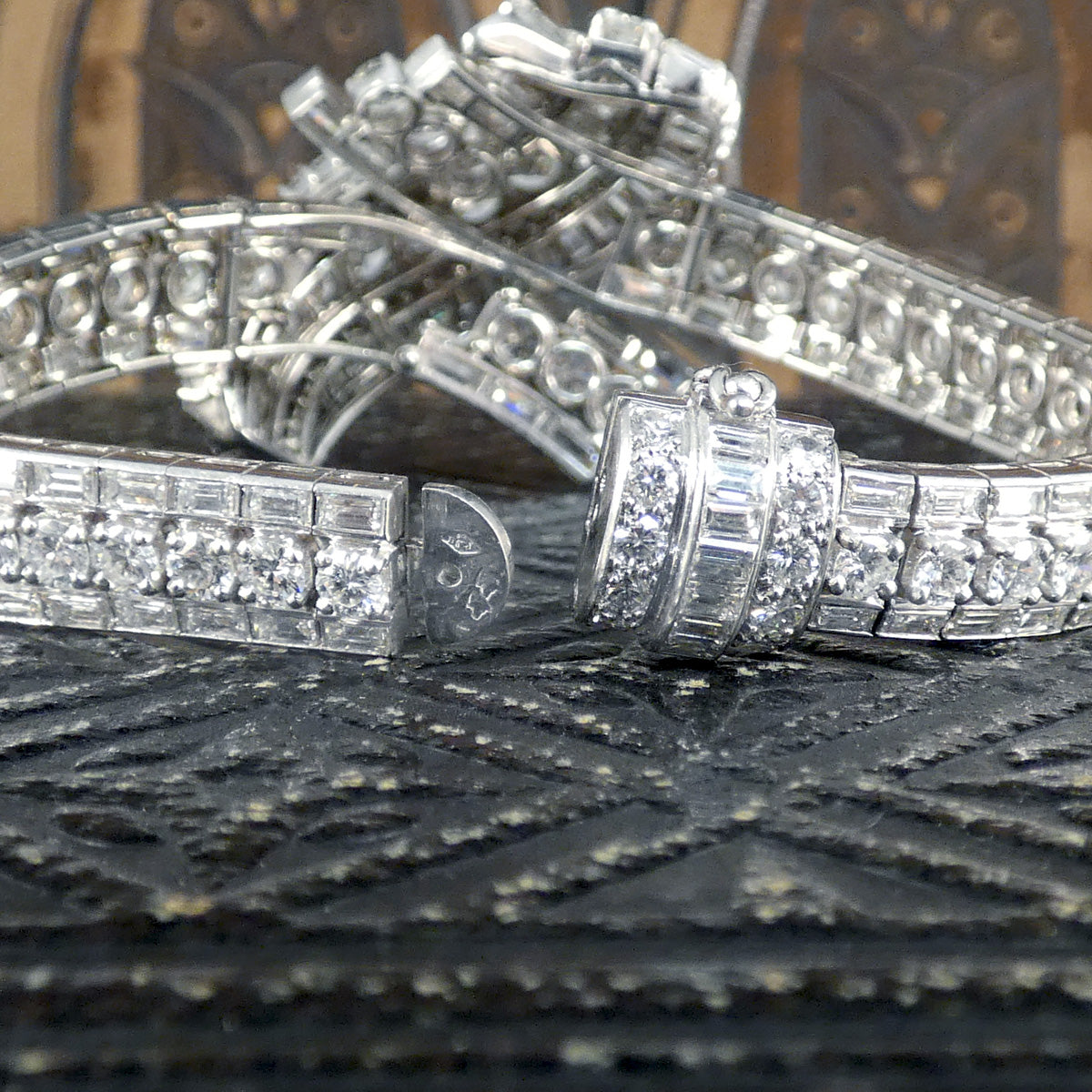 Close-up detail of the 1950's French diamond bracelet showcasing the 18ct white gold and platinum hallmarks, along with its secure fastening mechanism.