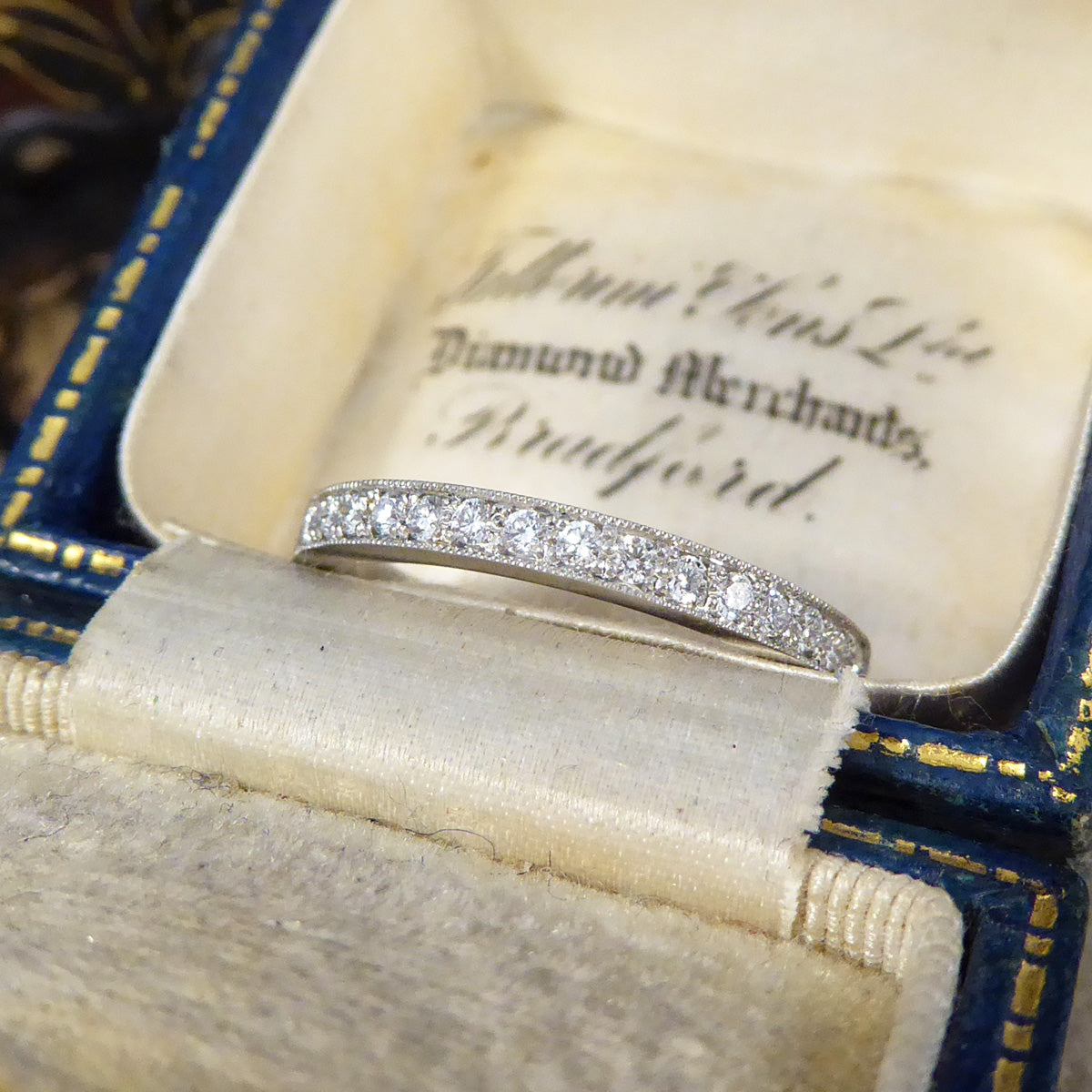 Modern Brilliant Cut Diamond Channel Set Half Eternity Ring in Platinum