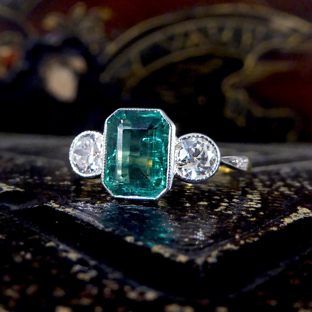 Contemporary Edwardian Style 1.30ct Emerald Cut Emerald and Diamond Three Stone Ring in 18ct Gold
