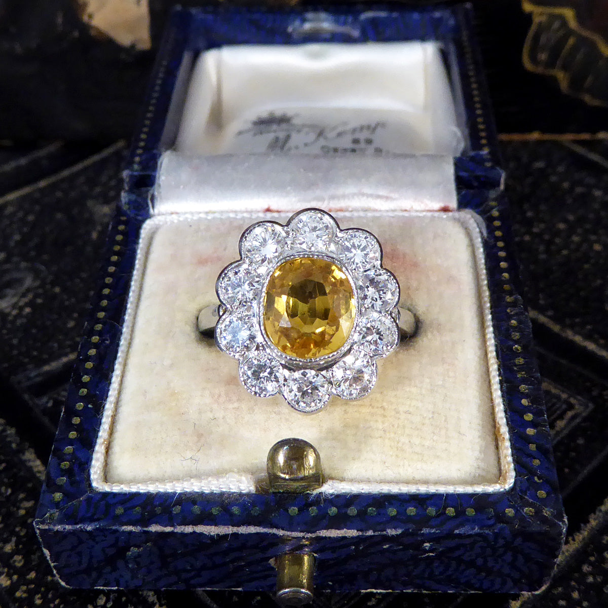 Bright and Rich 2.90ct Cushioned Oval Yellow Sapphire and 1.30ct Diamond Cluster Ring in Platinum