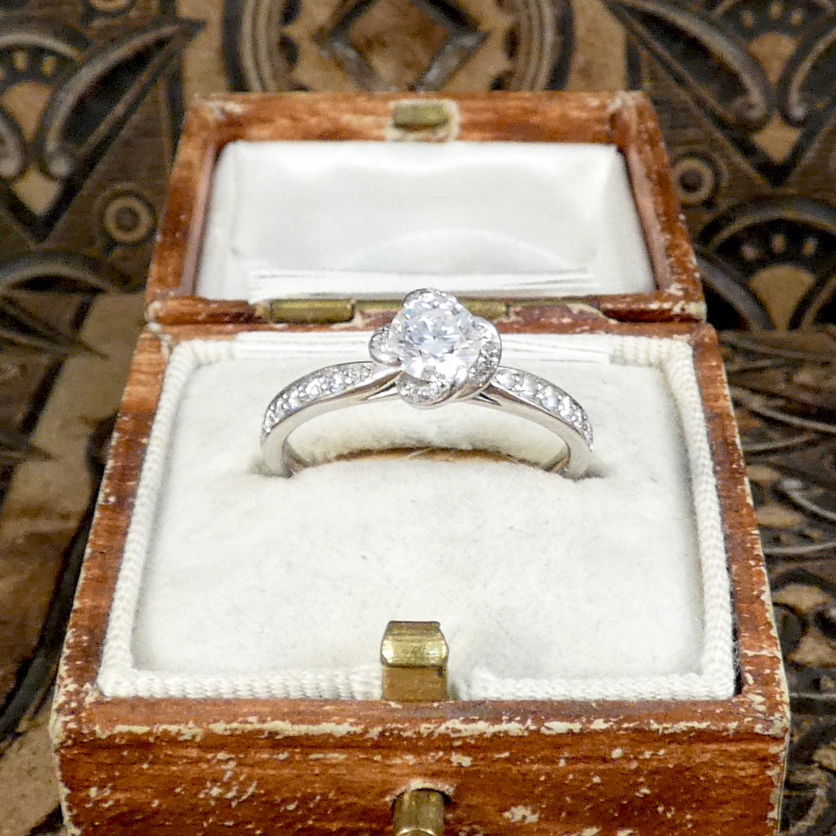 Enchanting Diamond Engagement Ring with Diamond Set twisted Detail Setting and Shoulders in 18ct White Gold. Show in in vintage box.