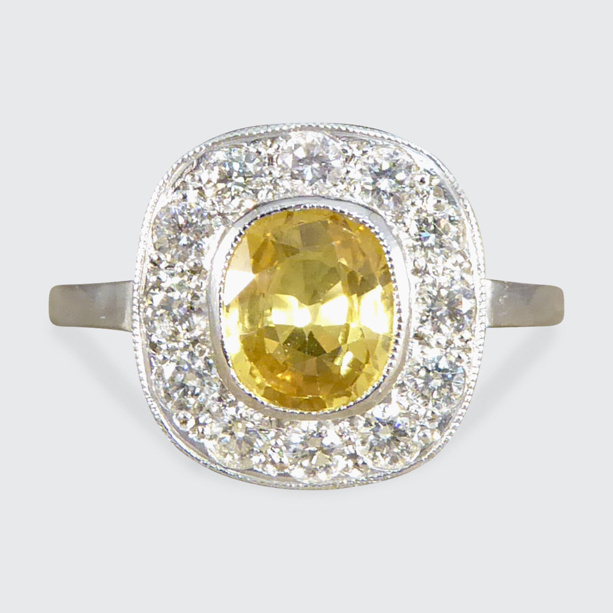 Contemporary 1.50ct Yellow Sapphire and Diamond Cluster Ring in Platinum