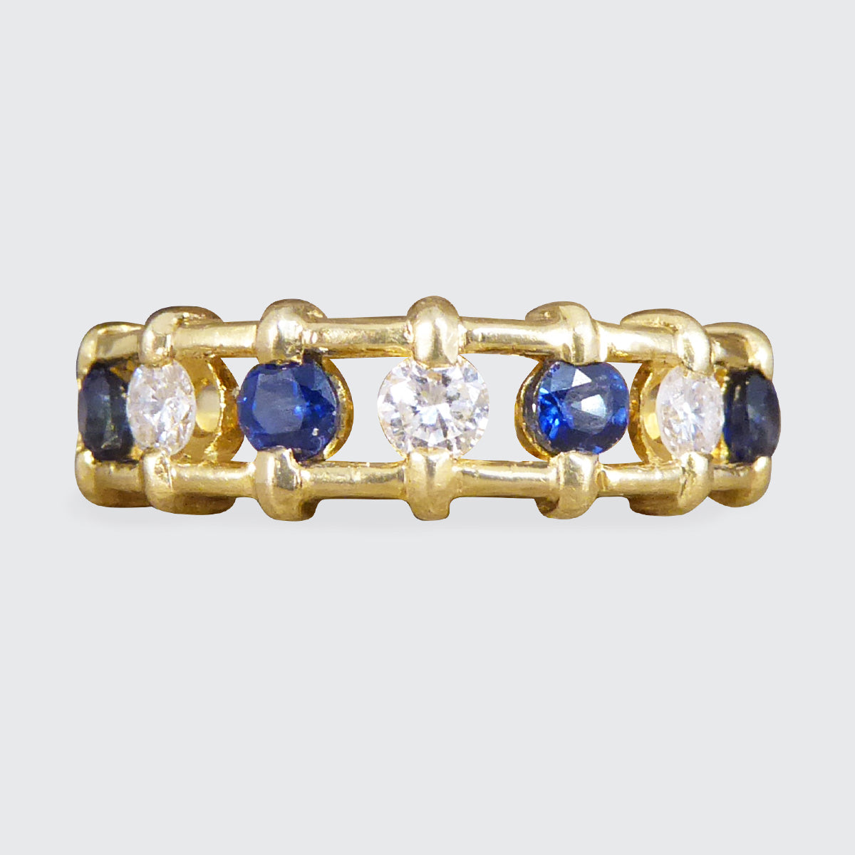 Unusual Sapphire and Diamond Spacer Ring in 18ct Yellow Gold