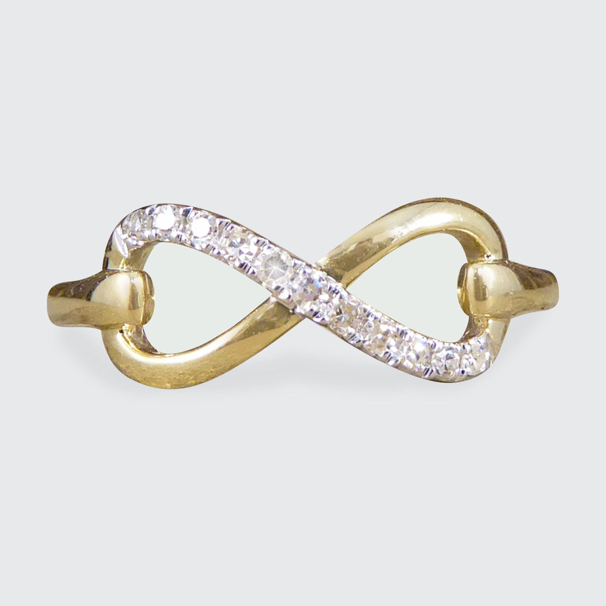 Contemporary Diamond Set Infinity Love Ring in 9ct Yellow Gold