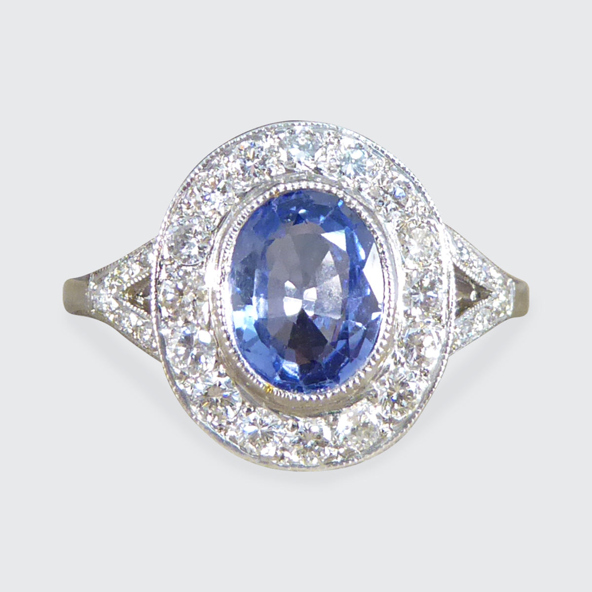 Art Deco Style 1.50ct Sapphire and Diamond Cluster Ring with Diamond Shoulders in Platinum