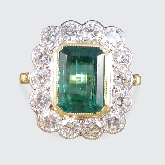 Contemporary Edwardian Style 2.50ct Emerald and 1.20ct Diamond Cluster Ring in 18ct Gold