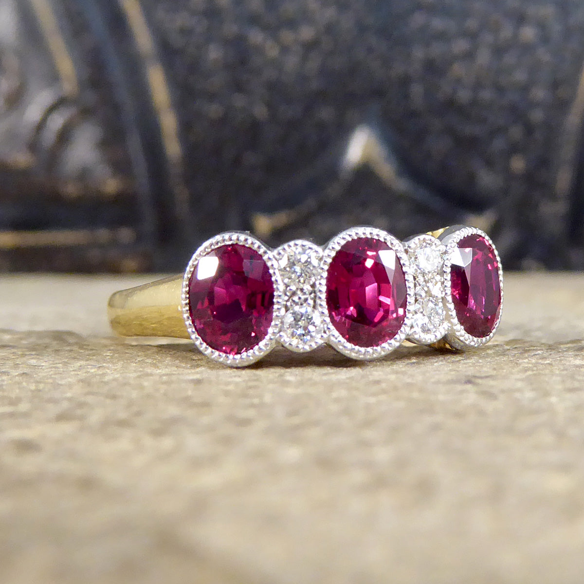 Quality Burma Ruby Three Stone Ring with Diamond Spacers in 18ct Yellow and White Gold