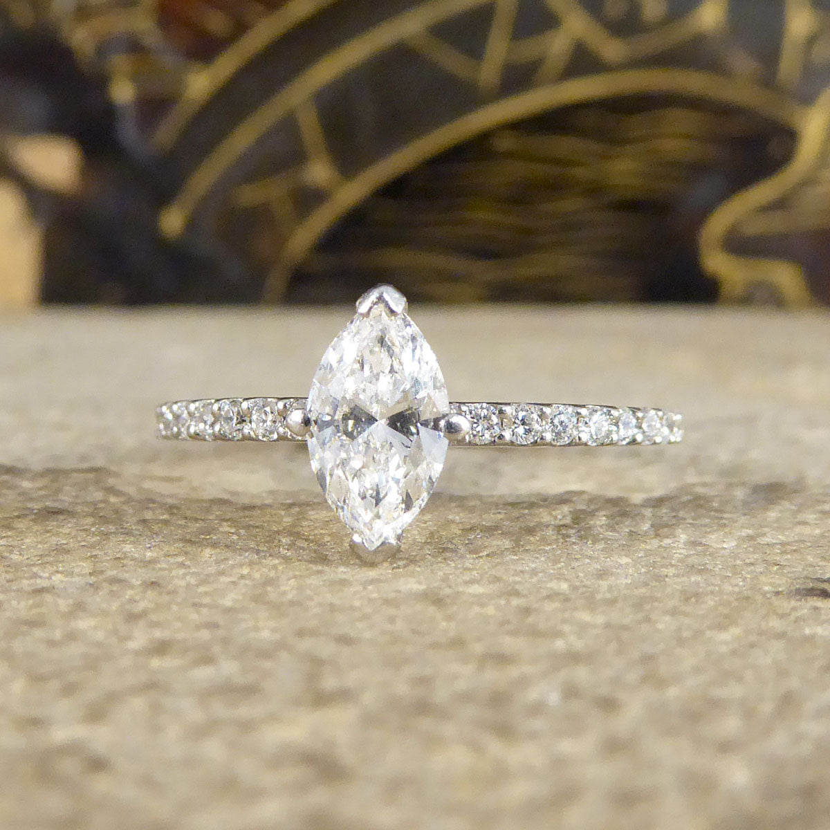 0.55ct Marquise Cut Diamond Solitaire Engagement Ring with Diamond Shoulders in Platinum