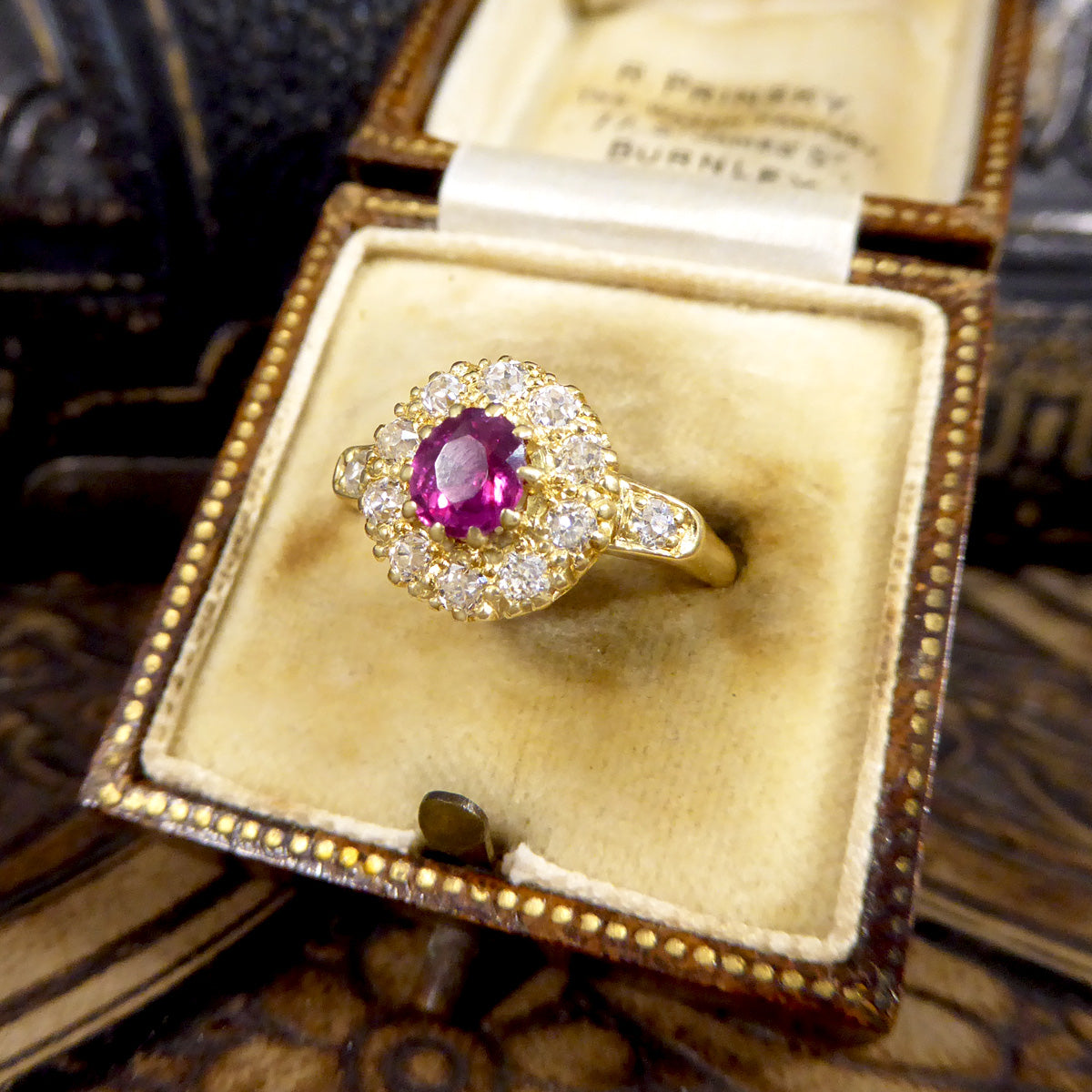 Late Victorian Ruby and Diamond Cluster Ring with Diamond Set Shoulders in 18ct Yellow Gold