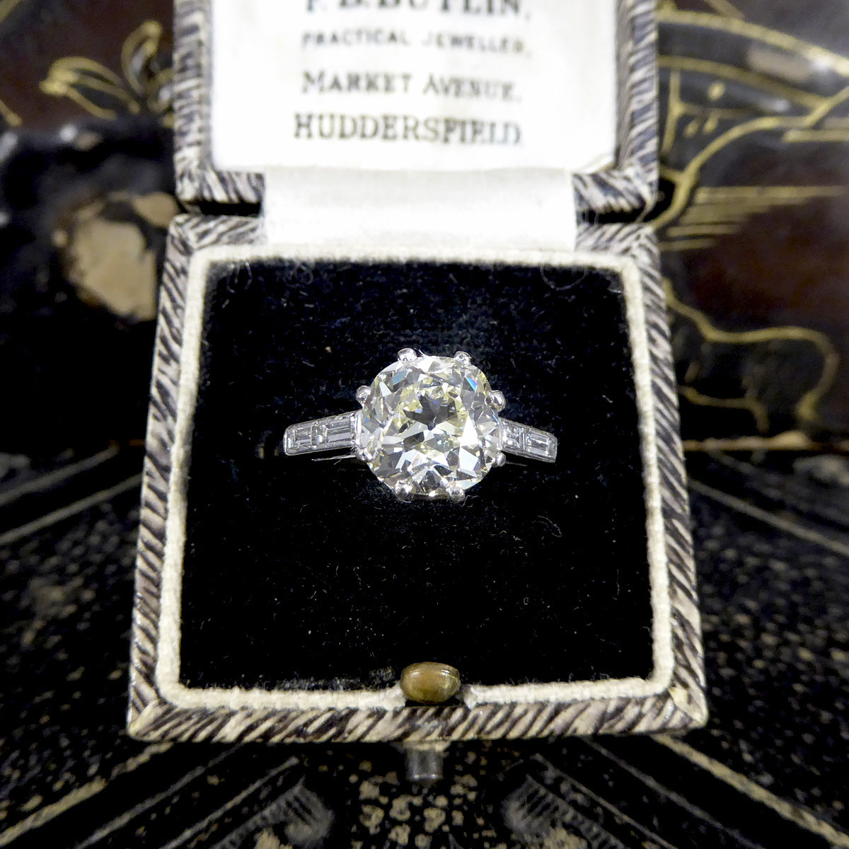 1920's 2.57ct Cushioned Shaped Old Mine Cut Diamond Engagement Ring with Shoulder in Platinum